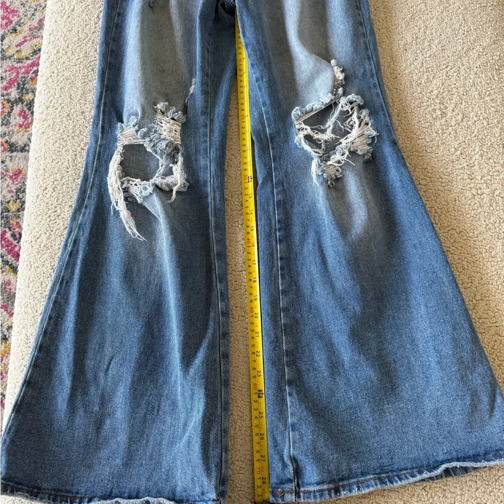 Almost Famous women's Light Blue Distressed flared Jeans